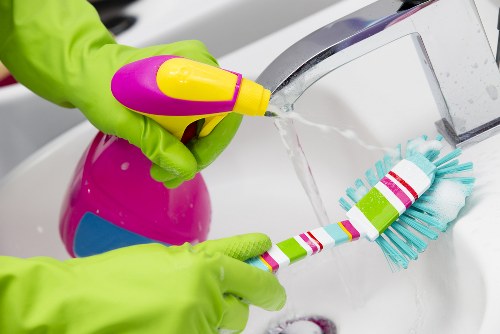 Professional cleaners working in a Knightsbridge property with local access challenges